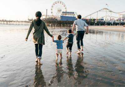 Family enjoying time together at a California beach
