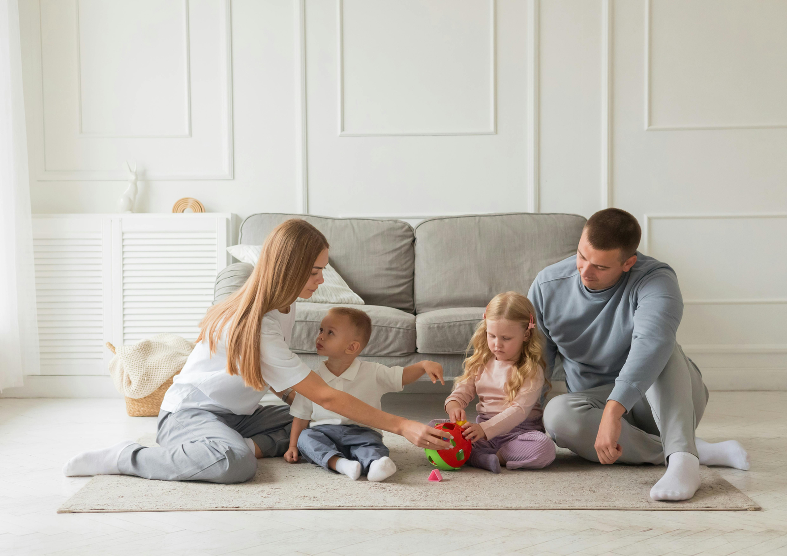 Young San Diego family with a toddler at home, protected by life insurance